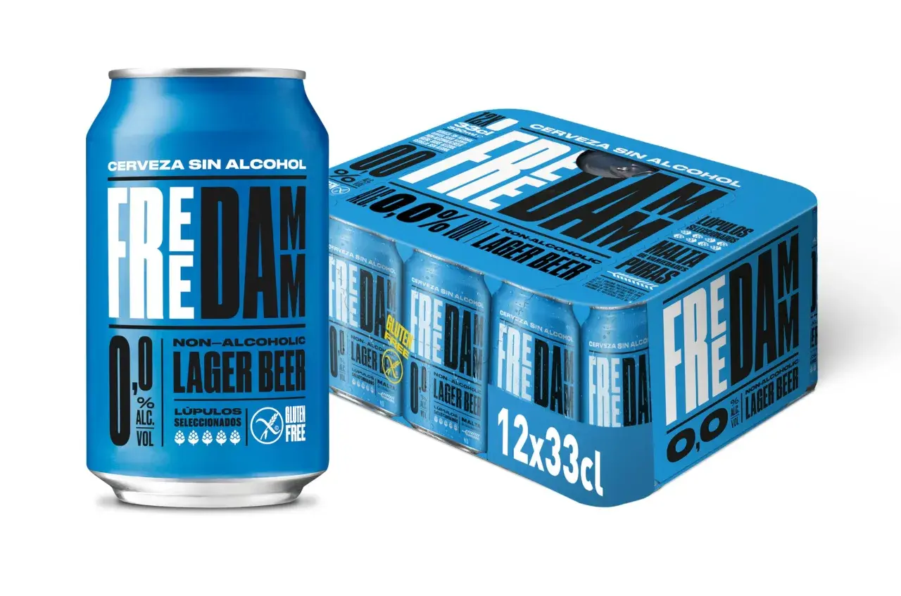 Lata y pack de cerveza sin alcohol Freddam, destacando sus ingredientes: lúpulos seleccionados y malta pura.